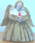angel with candle, in gold
