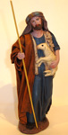 Shepherd Holding Sheep