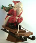 Sledding Santa and Elves